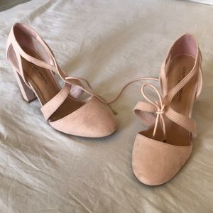 Pink heeled shoes with ties